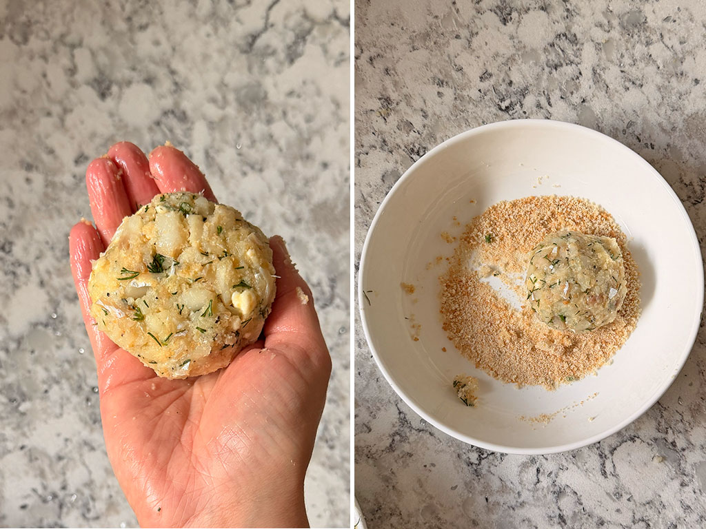 Hand holding a shaped cod fish cake patty on the left, and another patty being coated in breadcrumbs before frying on the right.