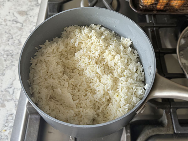 White garlicky lime rice in a pot.