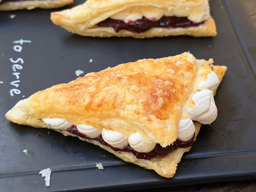 Flaky Puff Pastry Triangles with Berry and Cream Filling