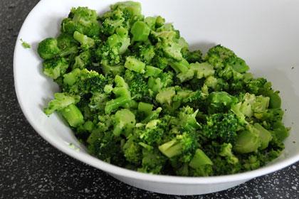 Drained and chopped broccoli in a large bowl.